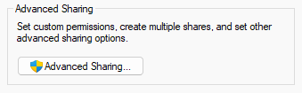 Folder properties box with the Sharing tab selected and an arrow pointing to the Advanced Sharing button. 